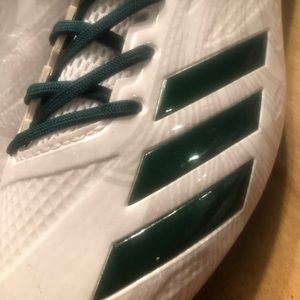 Men’s size 10 molded cleats. Never worn.